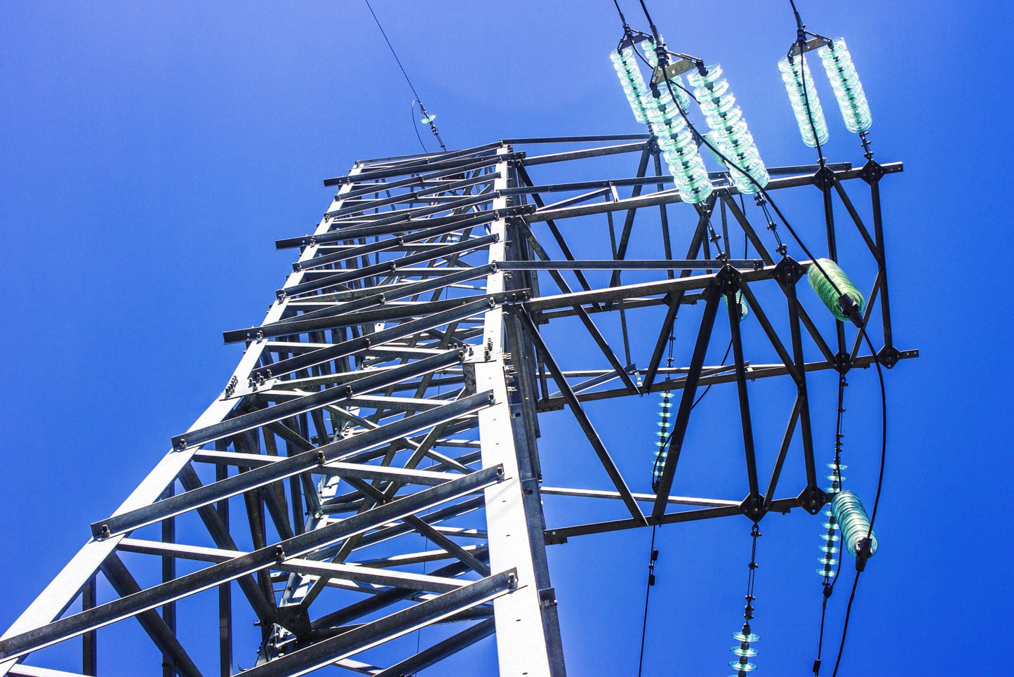 Photo of a high voltage power line structure, from below|Image depicting brain cancer caused by power lines|Increase Leukemia within 50 meters of power lines
